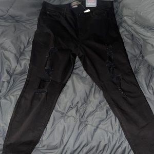 Black Ripped Skinny Jeans from Torrid